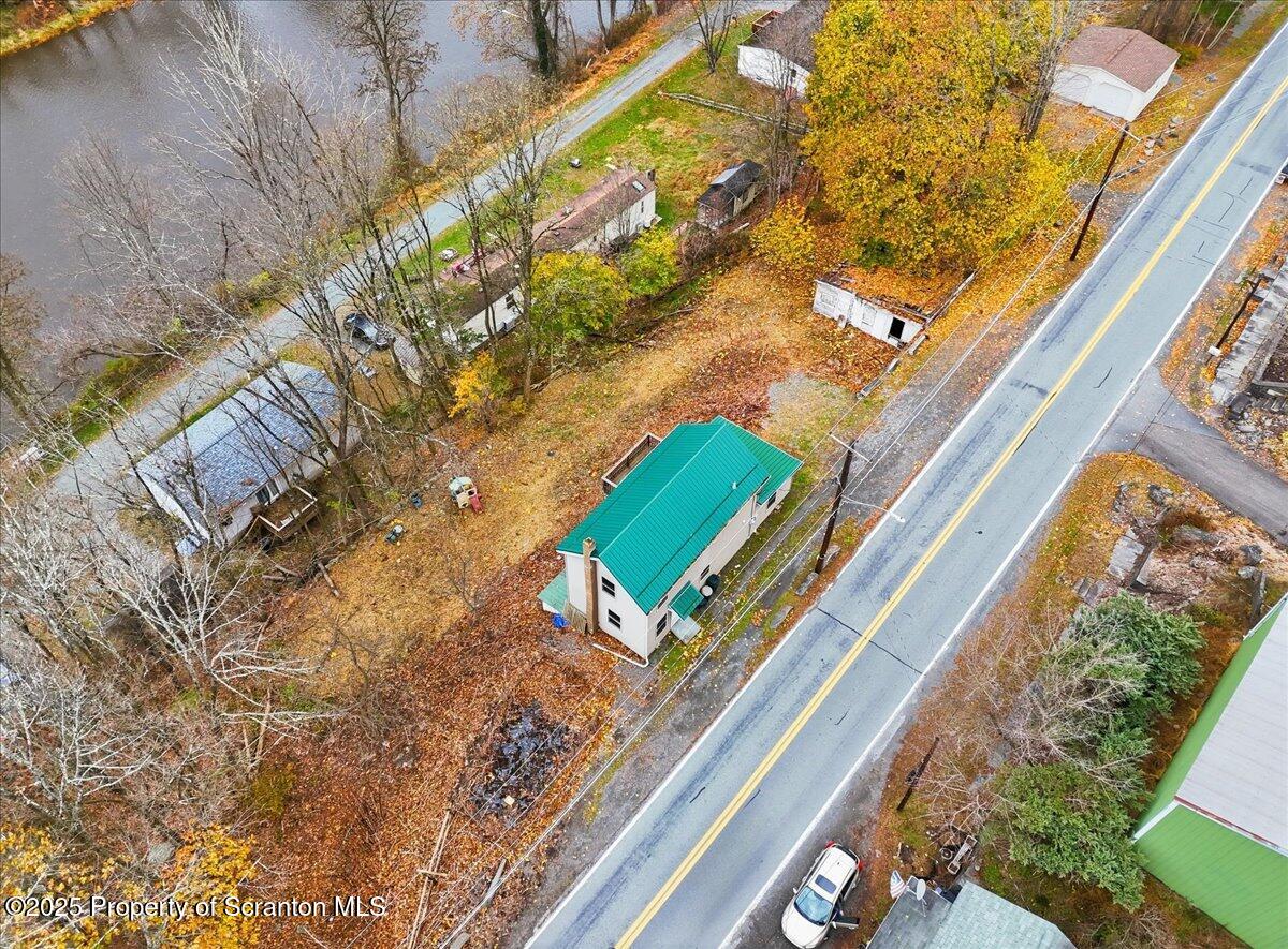 760 Hudson Street Hawley, PA 18428 - Photo 28 of 31 a picture of a book in the balcony