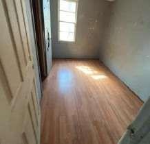 904 Travelers Home Church Road Ideal, GA 31041 - Photo 5 of 14 a view of empty room with wooden floor and fan