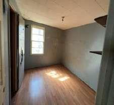 904 Travelers Home Church Road Ideal, GA 31041 - Photo 7 of 14 an empty room with wooden floor and windows