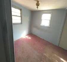 904 Travelers Home Church Road Ideal, GA 31041 - Photo 8 of 14 an empty room with a window
