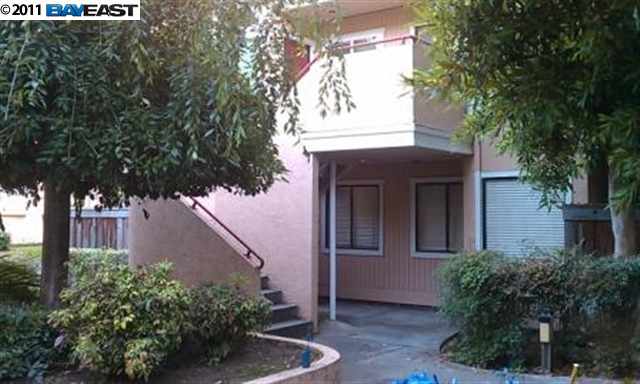 4670 Devonshire Common Fremont, CA 94536 - Photo 1 of 1 a front view of a house with plants