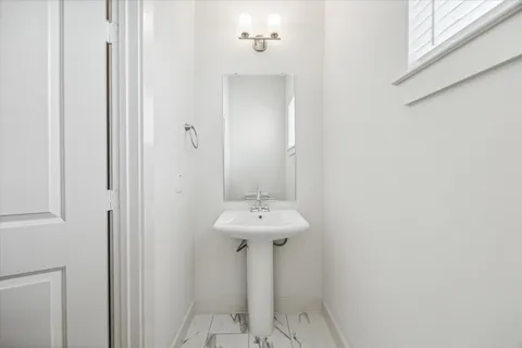 a sink with a mirror