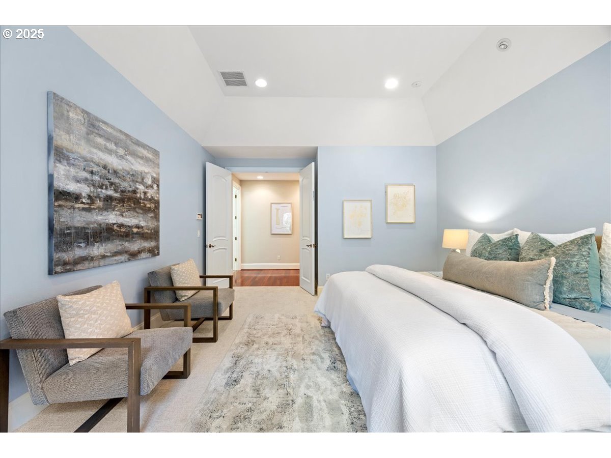 5436 Southwest Champion Place Portland, OR 97225 - Photo 21 of 37 a bedroom with a bed and furniture