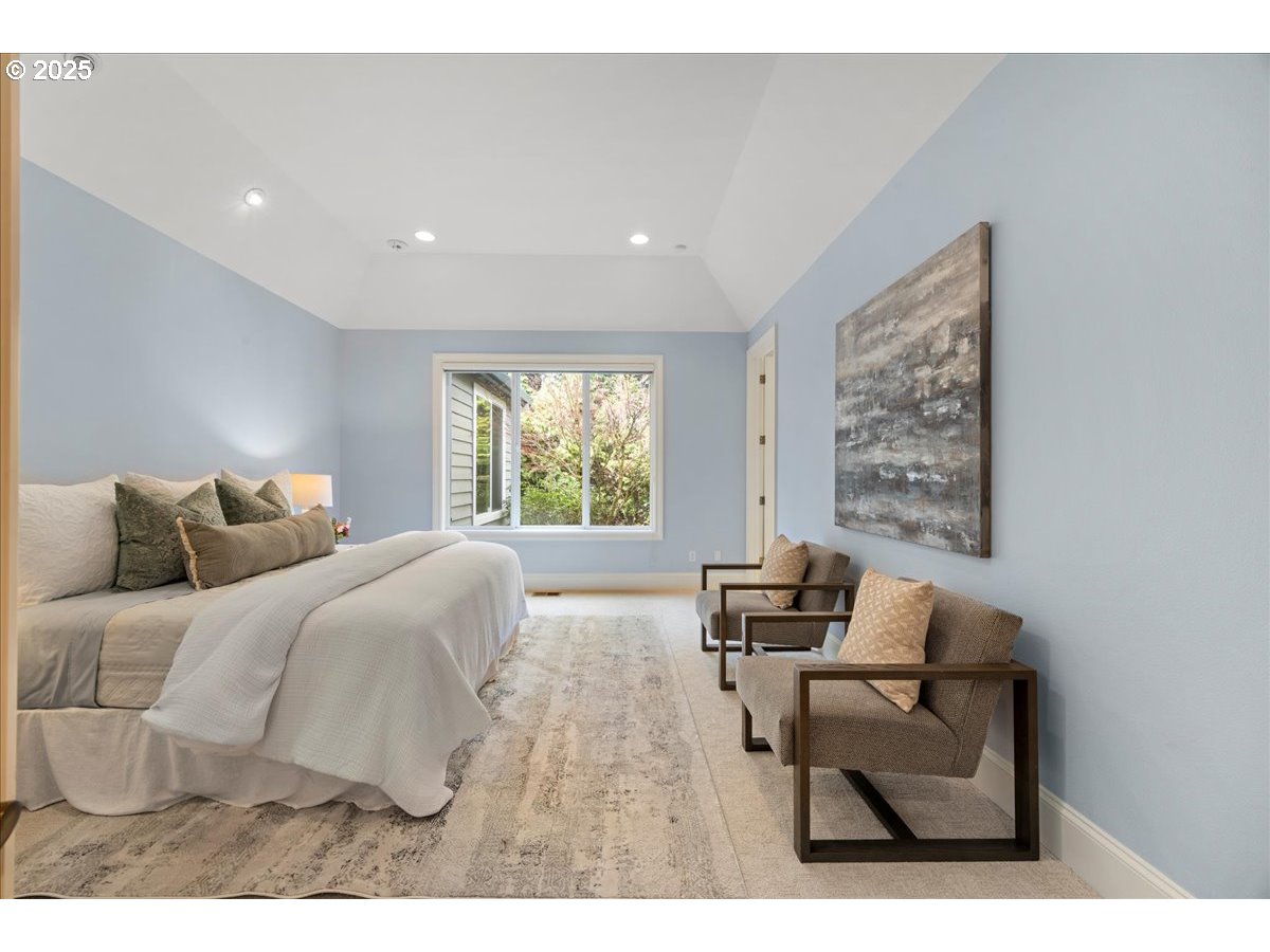 5436 Southwest Champion Place Portland, OR 97225 - Photo 22 of 37 a bedroom with a bed and a couch