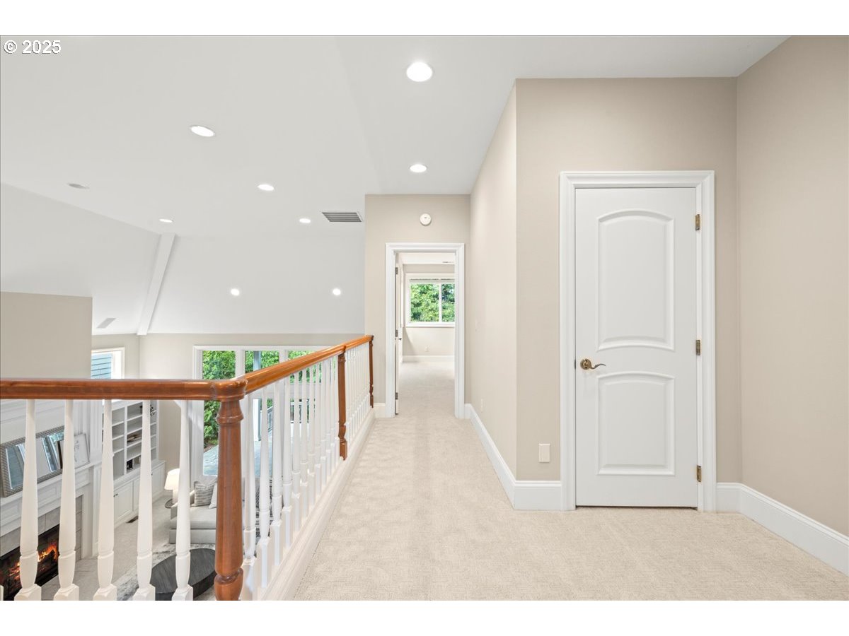 5436 Southwest Champion Place Portland, OR 97225 - Photo 28 of 37 a view of a hallway with wooden floor
