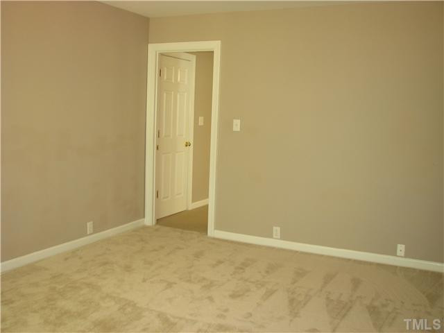 5029 Bartons Enclave Lane Raleigh, NC 27613 - Photo 20 of 25 This bedroom adjoins the bonus room.