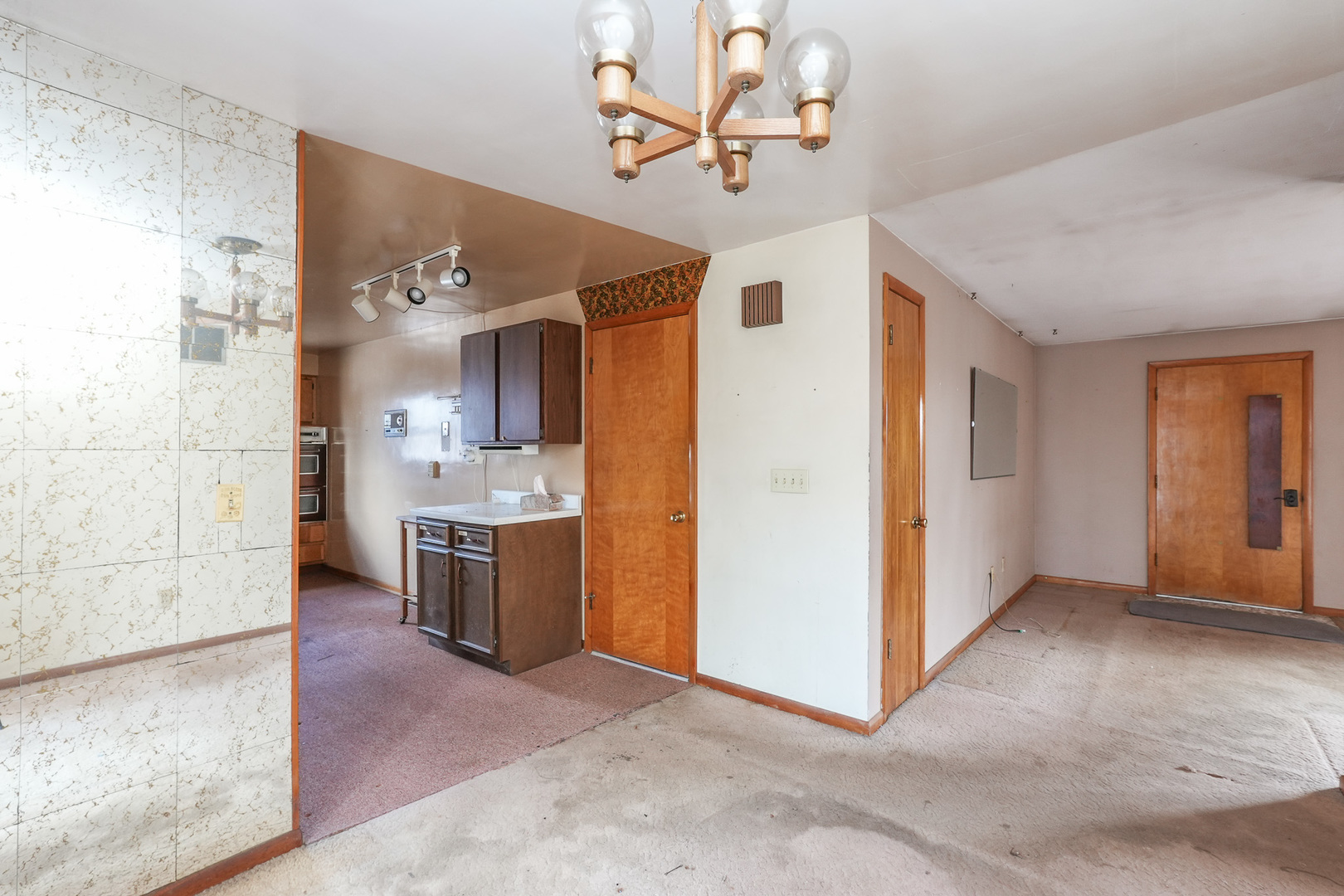164 North 5620W Road Kankakee, IL 60901 - Photo 14 of 37 a view of a kitchen with a sink and a refrigerator
