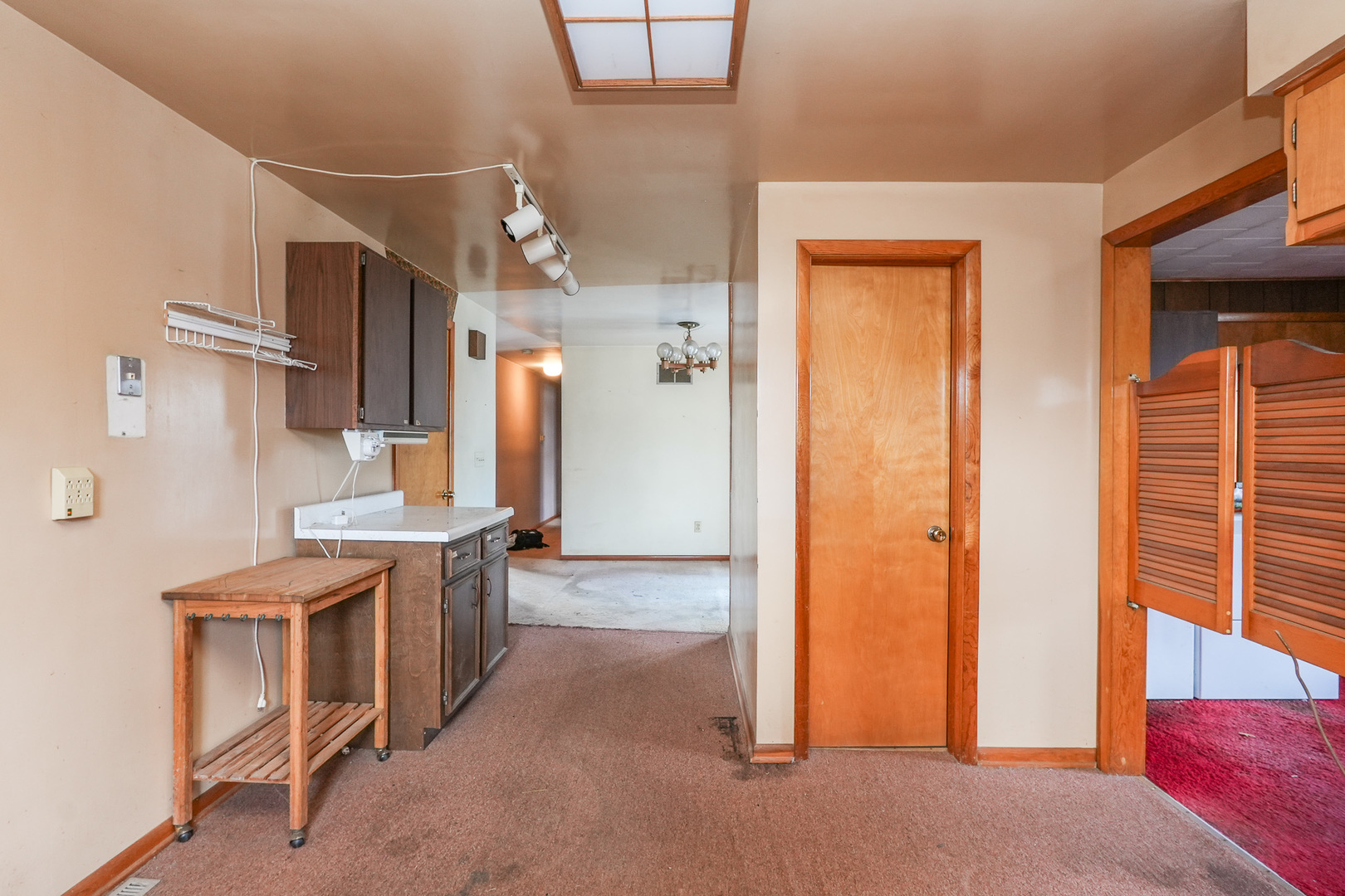 164 North 5620W Road Kankakee, IL 60901 - Photo 21 of 37 a kitchen with stainless steel appliances a sink stove and cabinets