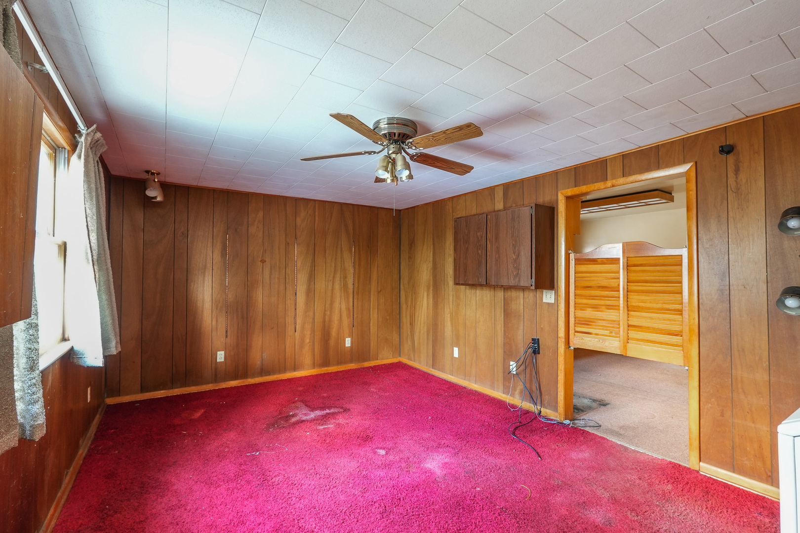 164 North 5620W Road Kankakee, IL 60901 - Photo 27 of 37 an empty room with fan and windows