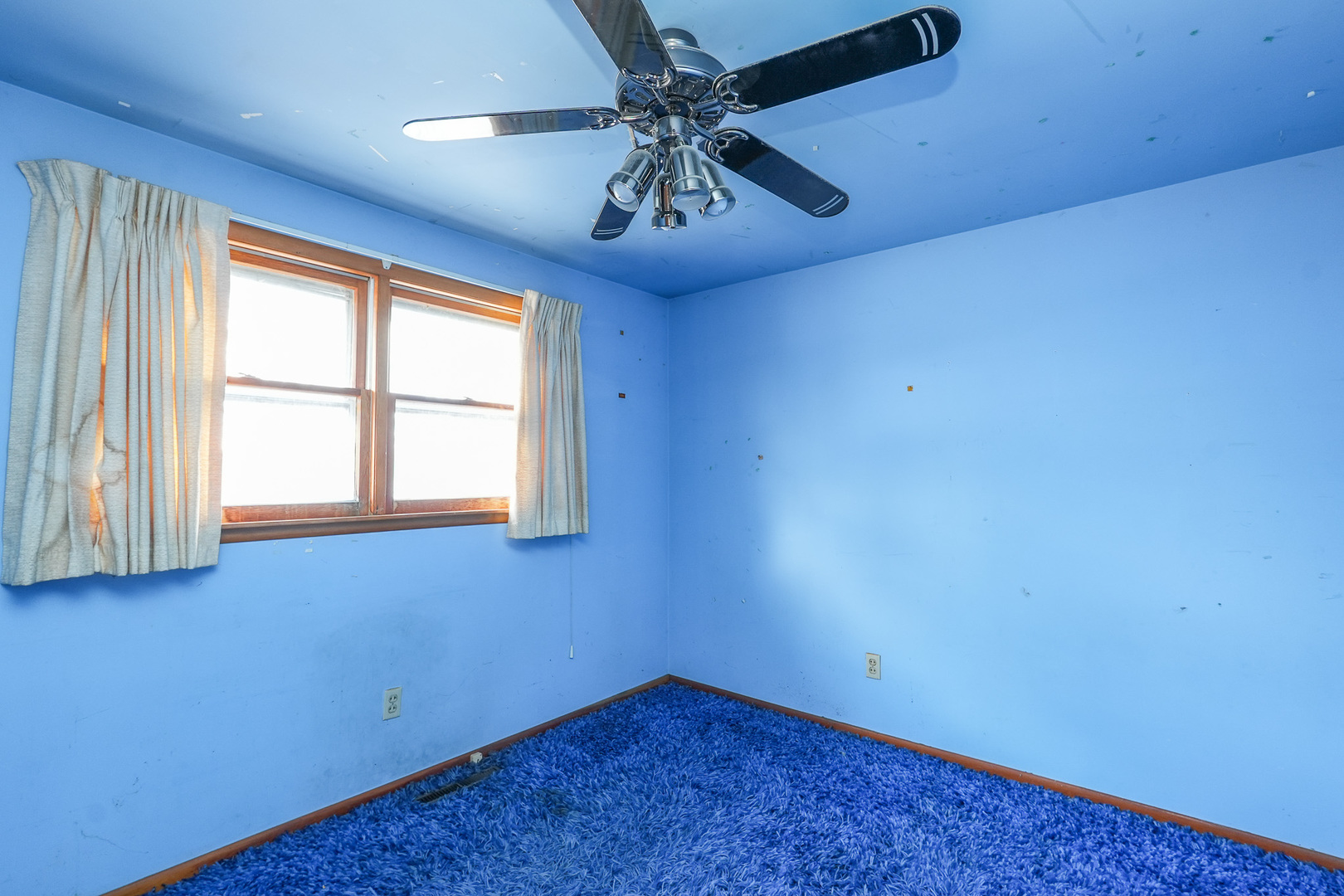 164 North 5620W Road Kankakee, IL 60901 - Photo 30 of 37 an empty room with windows and chandelier fan