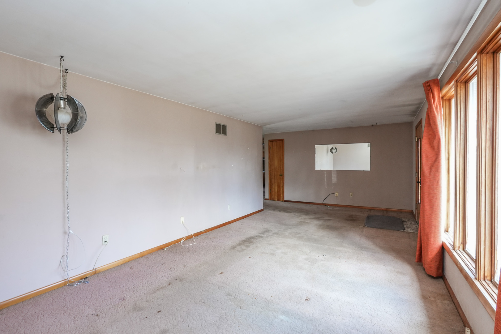 164 North 5620W Road Kankakee, IL 60901 - Photo 7 of 37 a view of a room with a window and a ceiling fan
