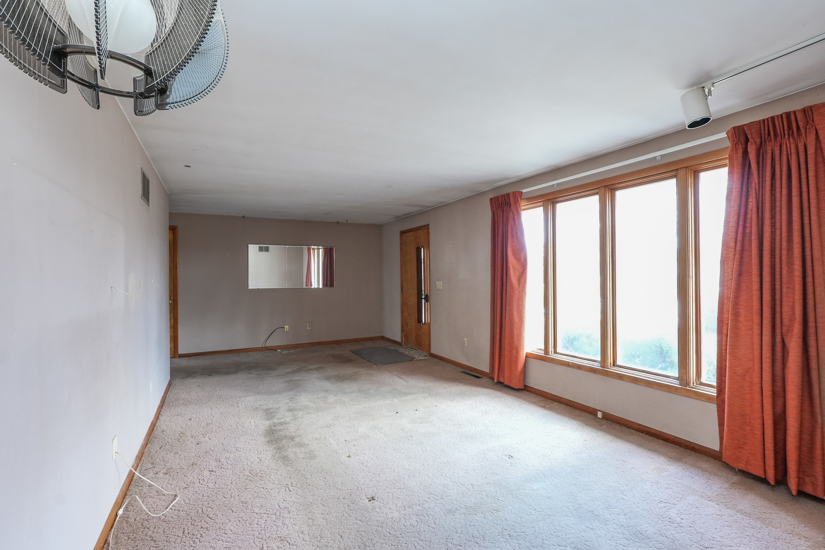 164 North 5620W Road Kankakee, IL 60901 - Photo 9 of 37 a view of an empty room with a window