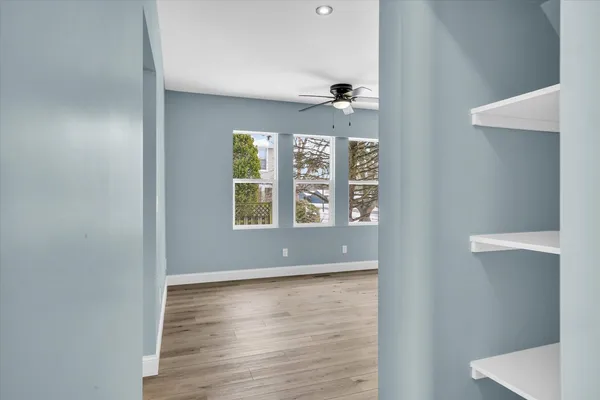 an empty room with windows