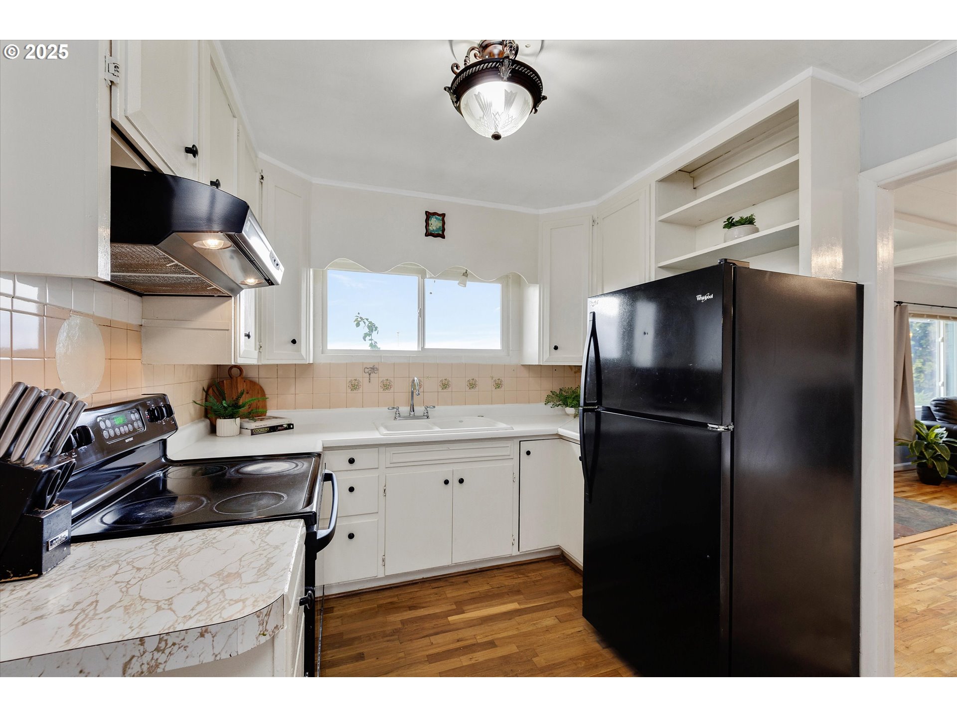 1684 Orchard Road Hood River, OR 97031 - Photo 10 of 47 a kitchen with stainless steel appliances granite countertop a sink a stove and a refrigerator