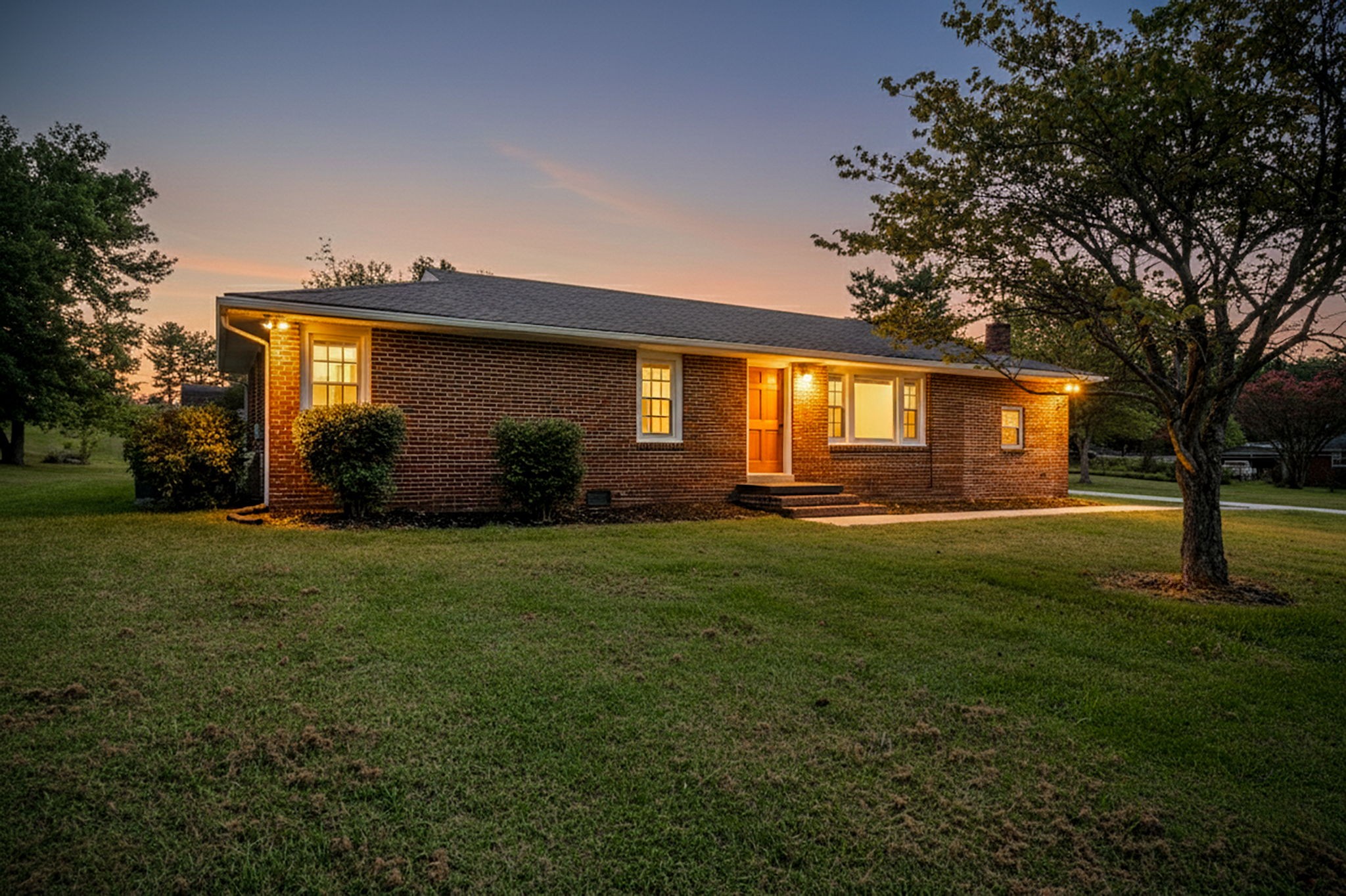 a house view with a garden space