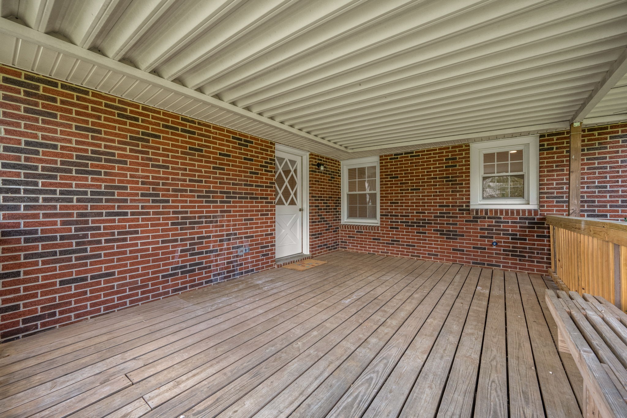 210 Rigney Drive Manchester, TN 37355 - Photo 27 of 39 a view of backyard with wooden deck