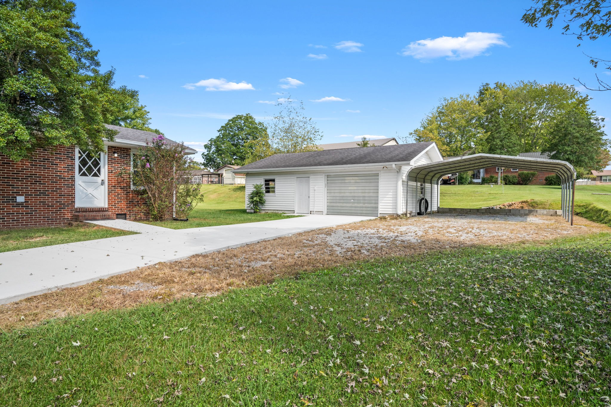 210 Rigney Drive Manchester, TN 37355 - Photo 29 of 39 a view of a house with a yard