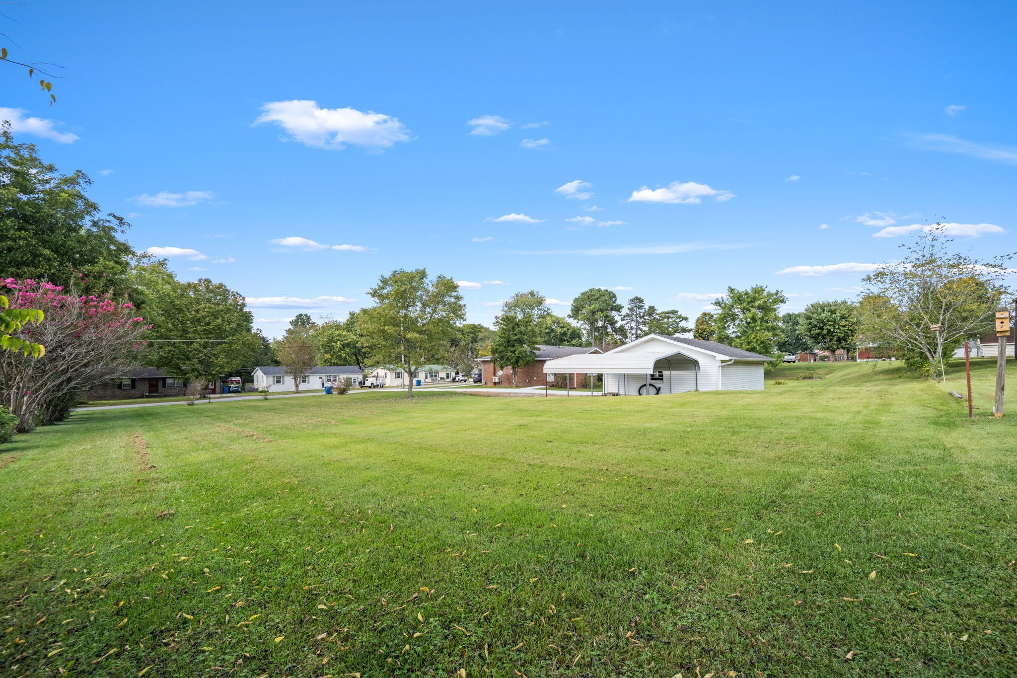 210 Rigney Drive Manchester, TN 37355 - Photo 35 of 39 a front view of a house with a garden