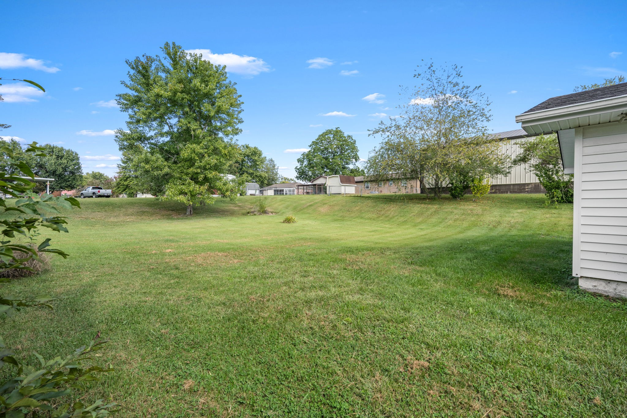 210 Rigney Drive Manchester, TN 37355 - Photo 36 of 39 a view of a golf course with a lake
