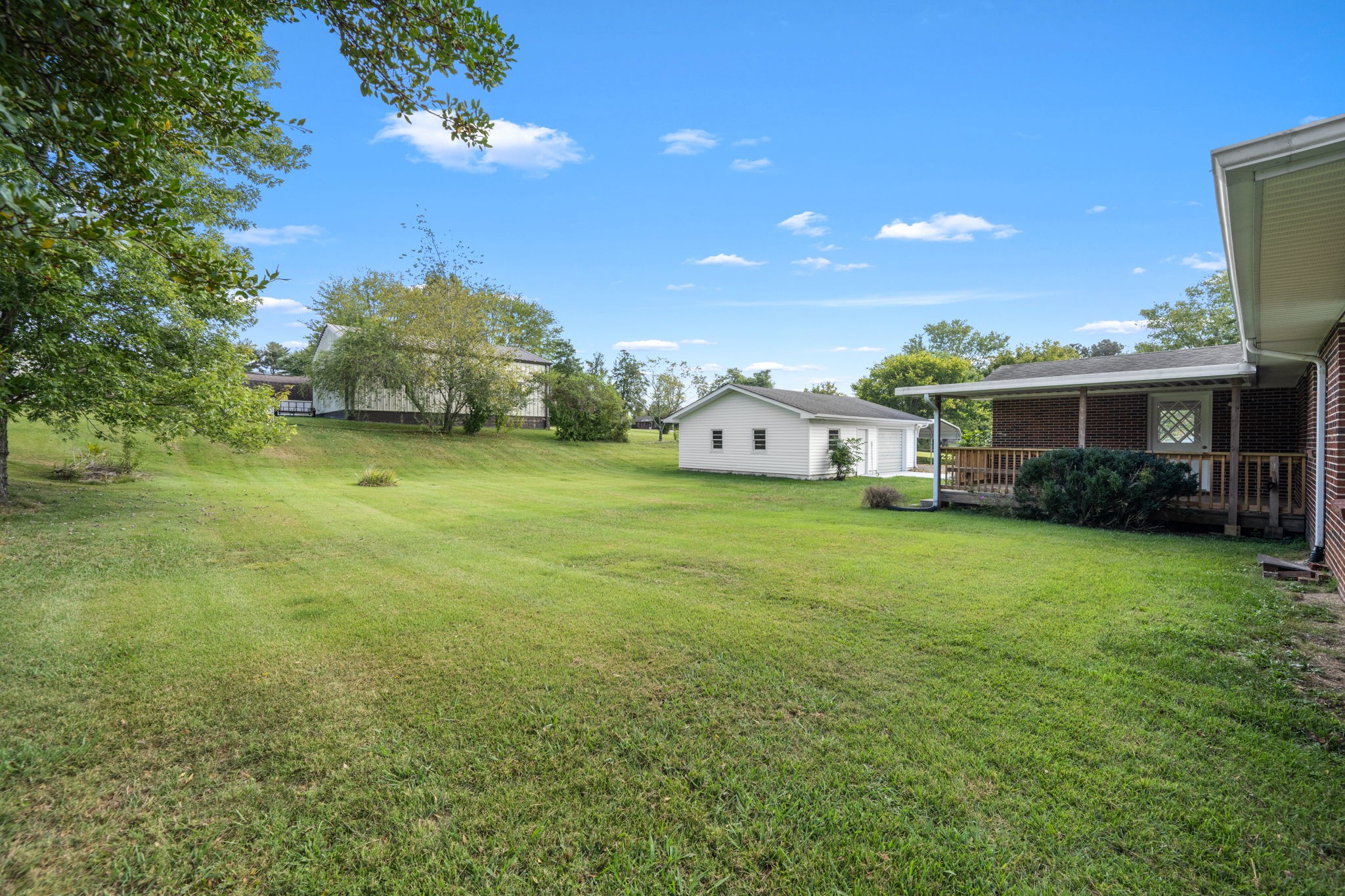 210 Rigney Drive Manchester, TN 37355 - Photo 39 of 39 a view of a house with a backyard