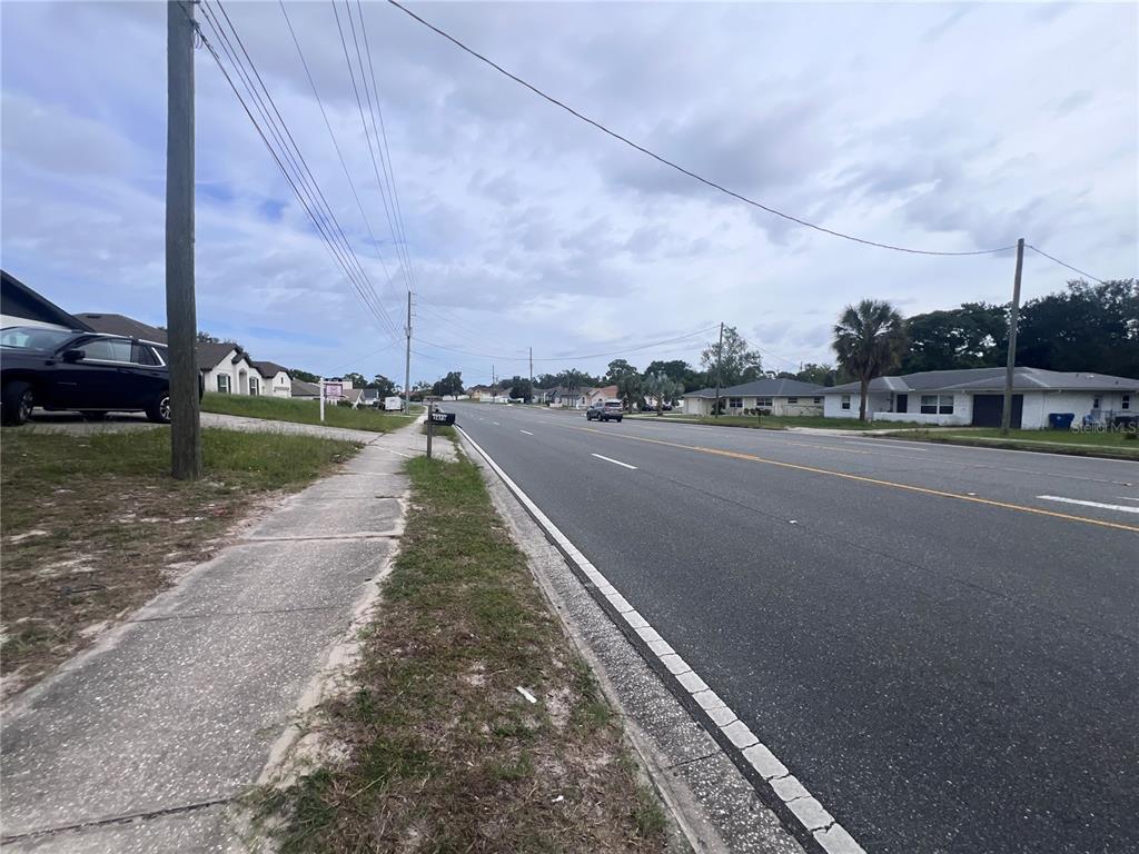 2469 Mariner Boulevard Spring Hill, FL 34608 - Photo 12 of 15 a view of a street with a building in the background