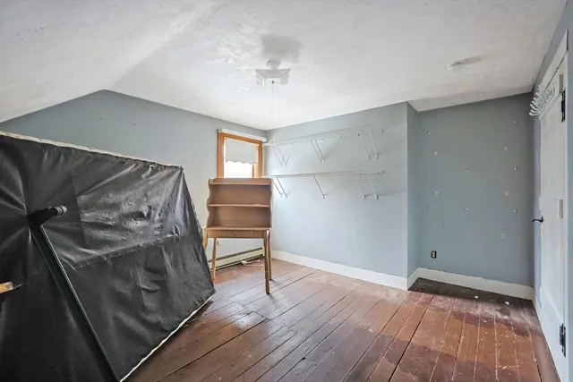 a view of a livingroom with wooden floor