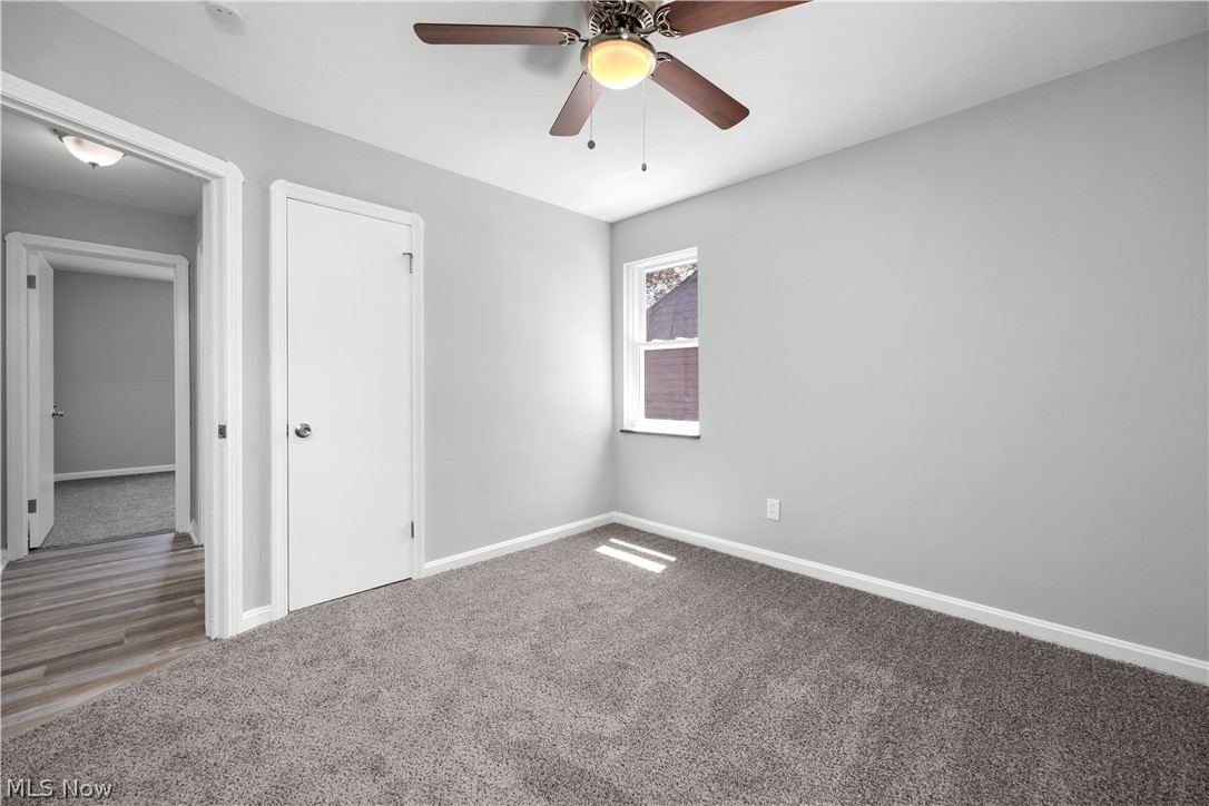 7030 Pearl Road Cleveland, OH 44130 - Photo 20 of 34 Unfurnished room featuring wood-type flooring and ceiling fan
