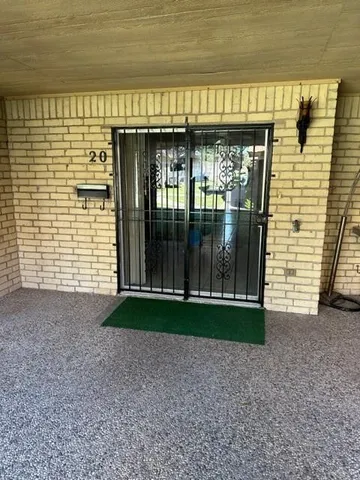 a front view of a house having yard
