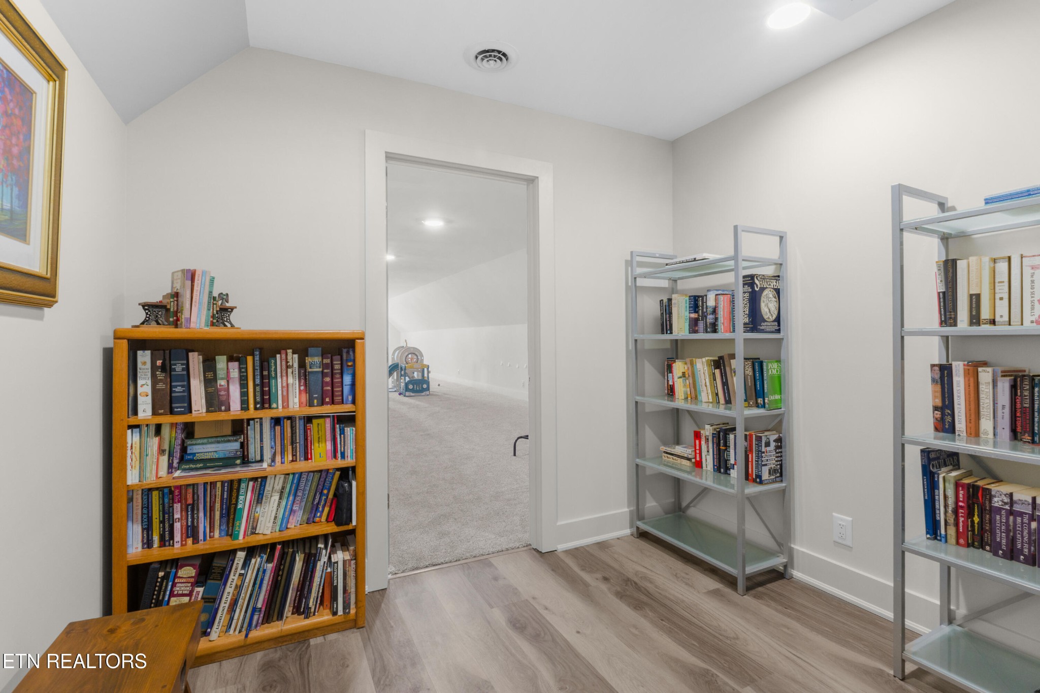 3702 Promontory Point Louisville, TN 37777 - Photo 36 of 60 a room with bookshelf and a window