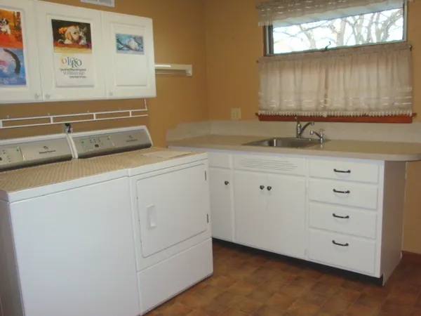 a bathroom with a sink and mirror