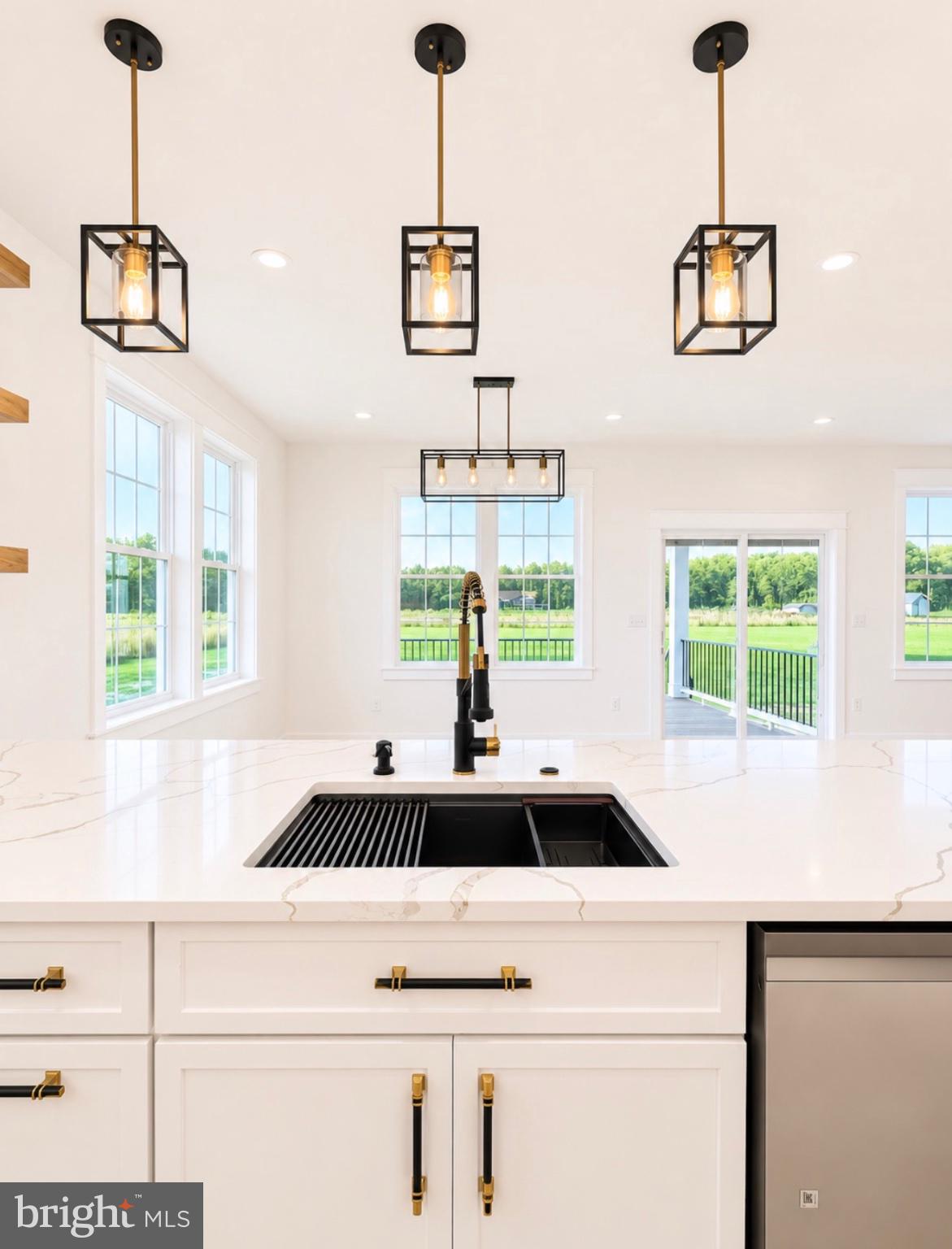 21963 Hardscrabble Road Georgetown, DE 19947 - Photo 7 of 43 Bright, modern kitchen with elegant fixtures.