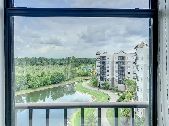 a view of a balcony with furniture