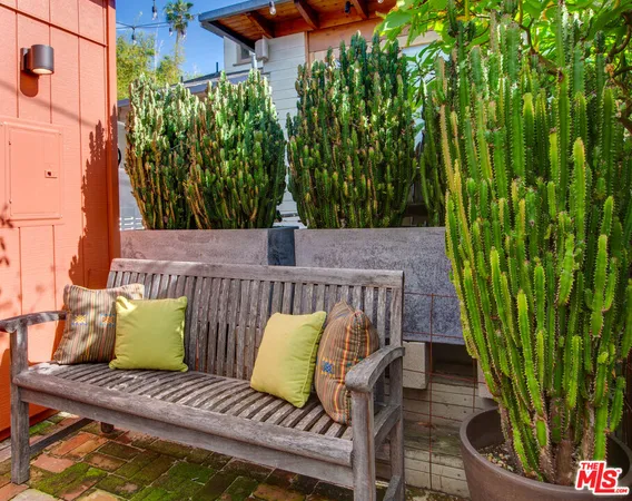 a view of balcony with furniture