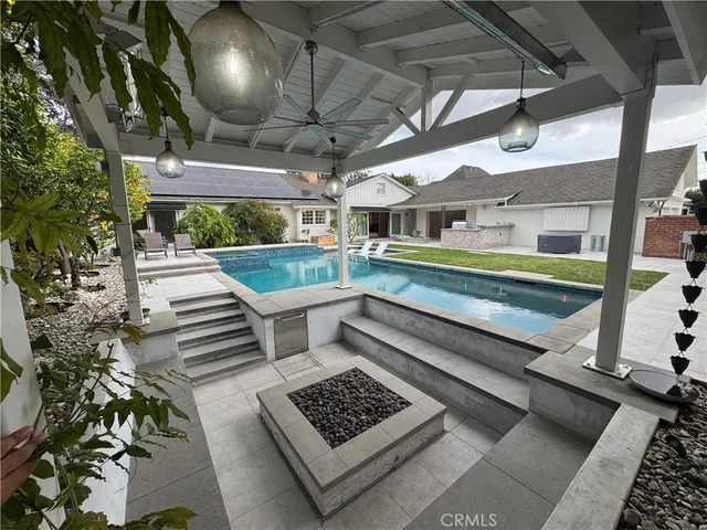 a view of a balcony with furniture