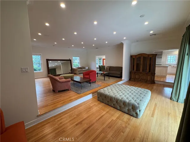a living room with furniture and a rug