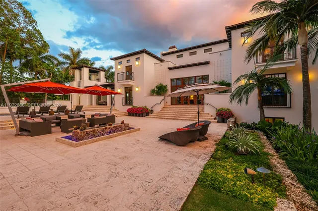 a front view of a house with patio