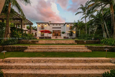 a view of a lake with a large trees