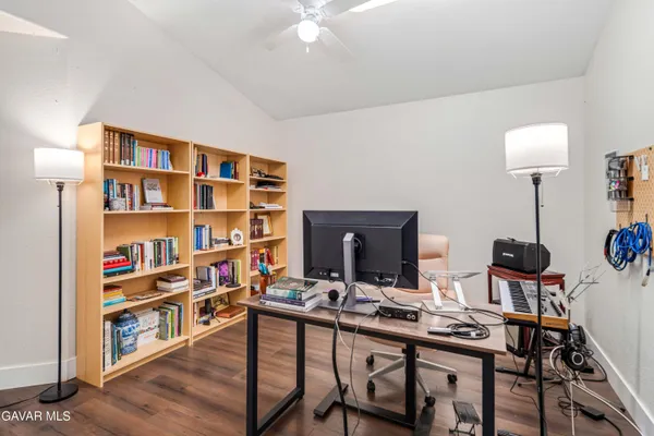 a view of a workspace with furniture