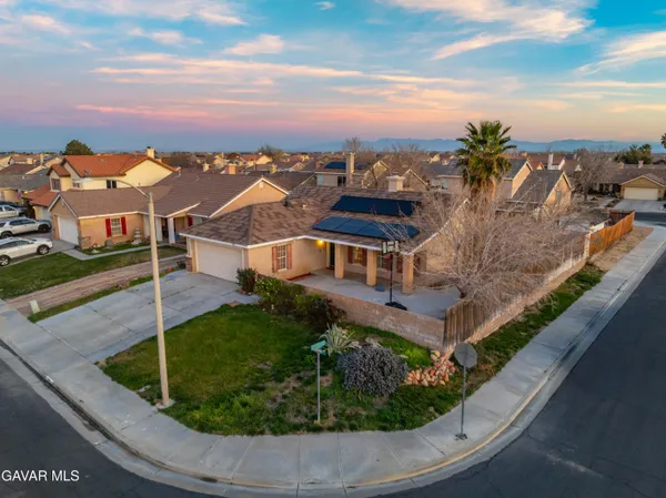 a view of a house with a ocean view