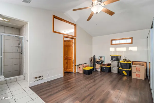 a view of a livingroom with furniture and a livingroom with furniture
