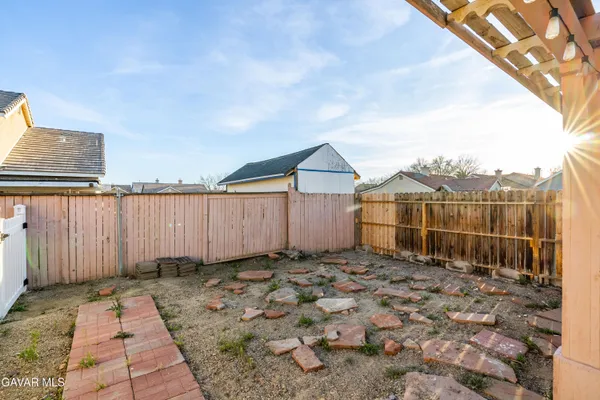 a view of a house with a patio