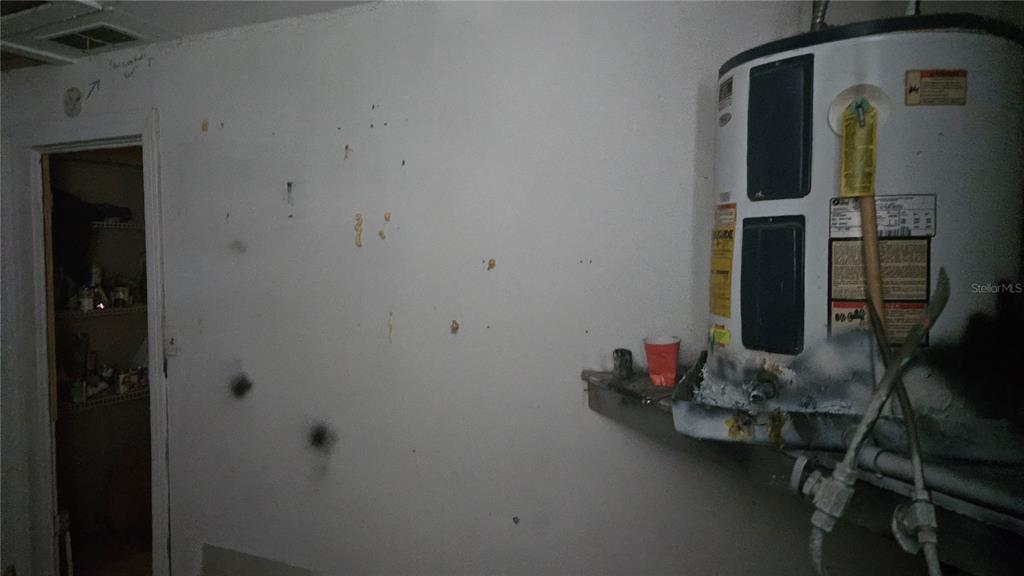 8428 Paxton Drive Port Richey, FL 34668 - Photo 33 of 100 a room with gym equipment and wooden floor