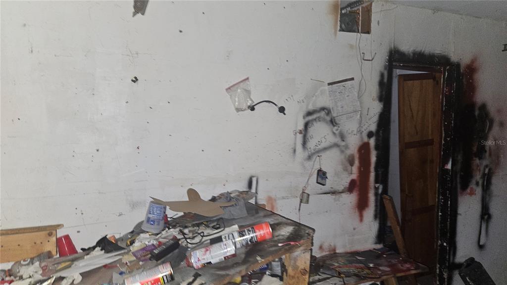 8428 Paxton Drive Port Richey, FL 34668 - Photo 42 of 100 a bathroom with a bathtub and a shower