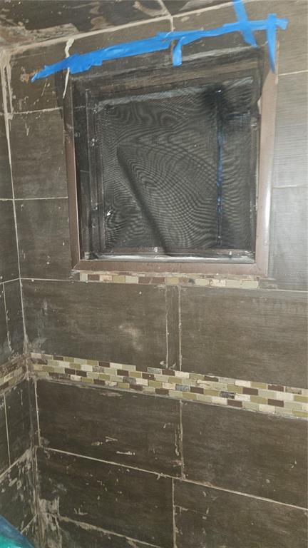 8428 Paxton Drive Port Richey, FL 34668 - Photo 45 of 100 a view of a glass door