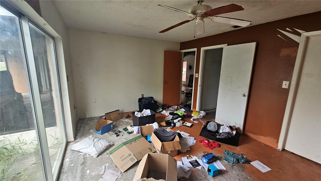 8428 Paxton Drive Port Richey, FL 34668 - Photo 61 of 100 a living room with furniture and wooden floor