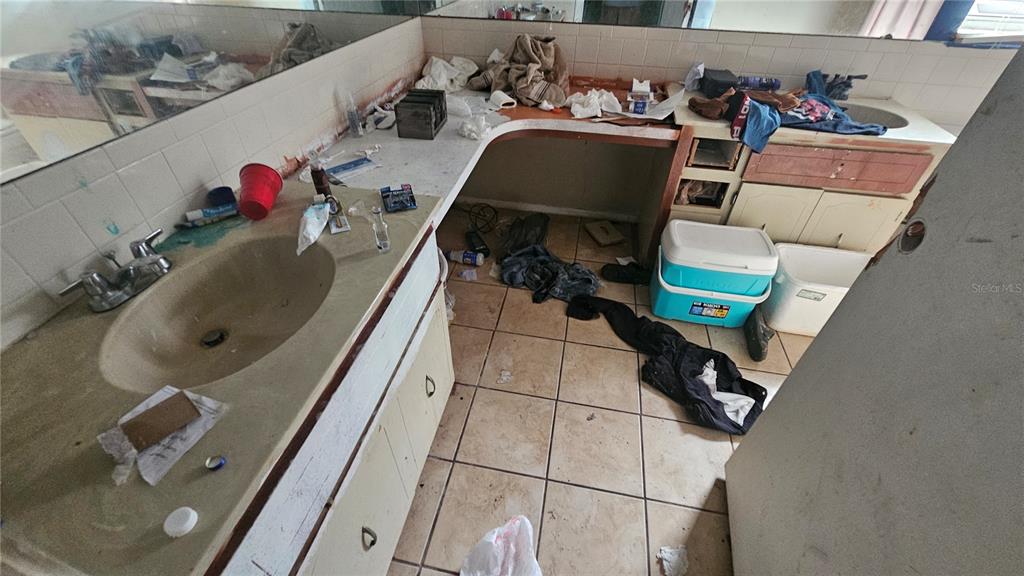 8428 Paxton Drive Port Richey, FL 34668 - Photo 67 of 100 a view of storage and utility room