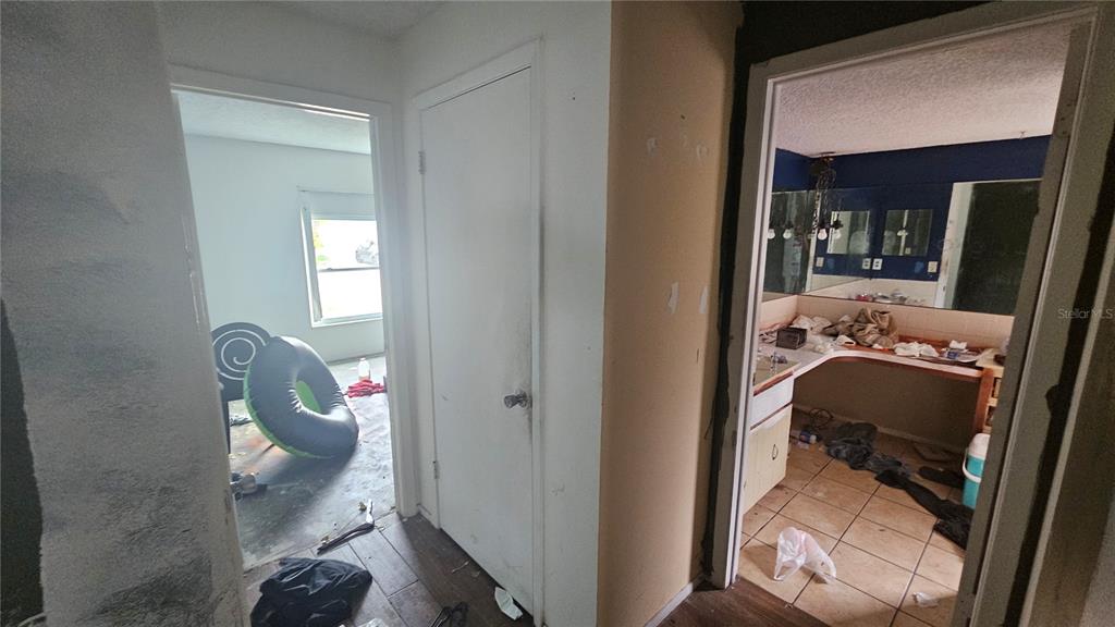 8428 Paxton Drive Port Richey, FL 34668 - Photo 76 of 100 a en suite bathroom with a toilet