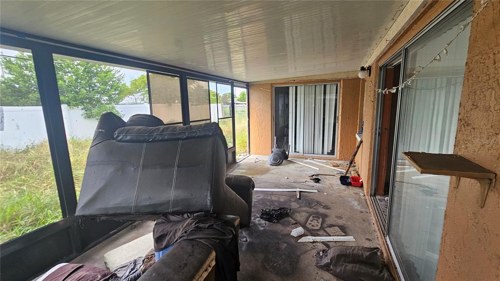 8428 Paxton Drive Port Richey, FL 34668 - Photo 88 of 100 a living room with furniture and a window