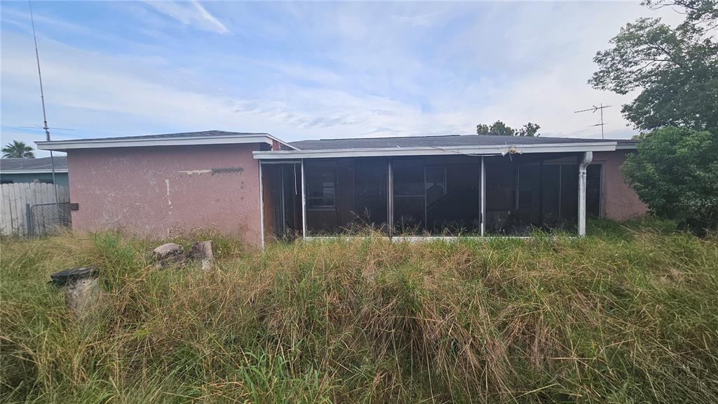 8428 Paxton Drive Port Richey, FL 34668 - Photo 98 of 100 a view of a house with a yard and plants