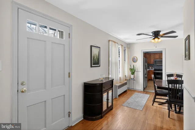 a view of a livingroom with furniture and wooden floor